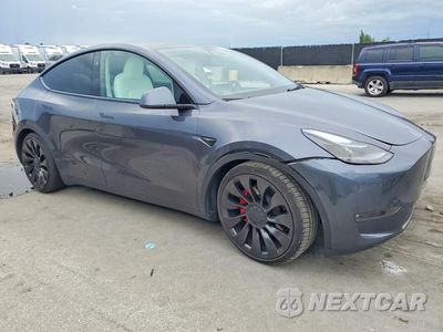 Czwarte zdjęcie samochodu z boku: 2023 TESLA MODEL Y VIN:7SAYGDEF0PF920230 - miniatura