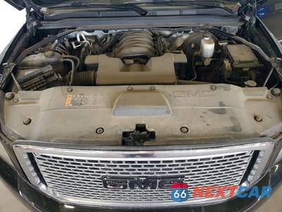 Zdjęcie 12 z 13 samochodu: 2017 GMC YUKON XL DENALI VIN:1GKS2HKJXHR261946 - miniatura