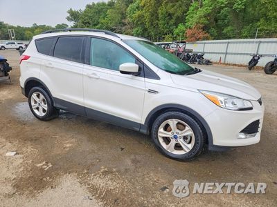 Czwarte zdjęcie samochodu z boku: 2014 FORD ESCAPE SE VIN:1FMCU0GX0EUC16205 - miniatura
