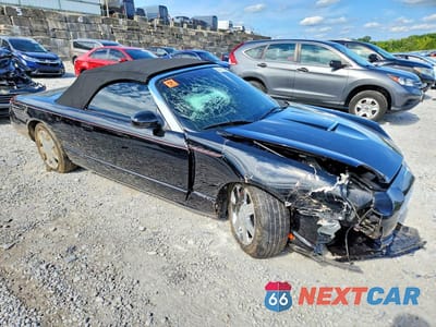 Czwarte zdjęcie samochodu z boku: 2002 FORD THUNDERBIRD VIN:1FAHP60A62Y123161 - miniatura