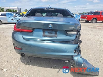 Zdjęcie 6 z 12 samochodu: 2021 BMW 330I VIN:3MW5R1J00M8C17041 - miniatura