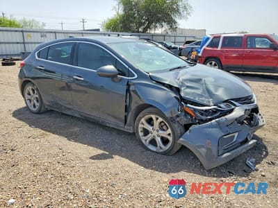 Czwarte zdjęcie samochodu z boku: 2017 CHEVROLET CRUZE PREMIER VIN:3G1BF6SM2HS526041 - miniatura