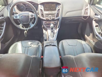 Zdjęcie 8 z 12 samochodu: 2014 FORD FOCUS TITANIUM VIN:1FADP3J21EL240653 - miniatura