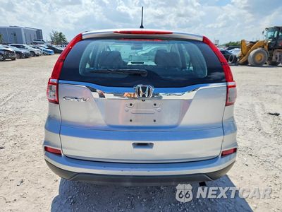 Zdjęcie 6 z 12 samochodu: 2016 HONDA CR-V LX VIN:3CZRM3H32GG706897 - miniatura