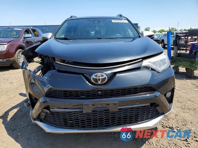 Piąte zdjęcie samochodu w środku: 2016 TOYOTA RAV4 SE VIN:JTMJFREV2GJ052942 - miniatura