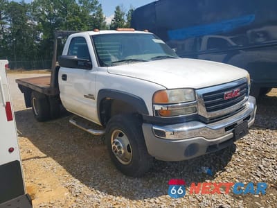 Czwarte zdjęcie samochodu z boku: 2005 GMC NEW SIERRA C3500 VIN:1GDJC34265E200105 - miniatura