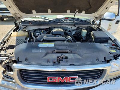 Zdjęcie 11 z 12 samochodu: 1999 GMC NEW SIERRA K1500 VIN:1GTEK14T0XE541573 - miniatura
