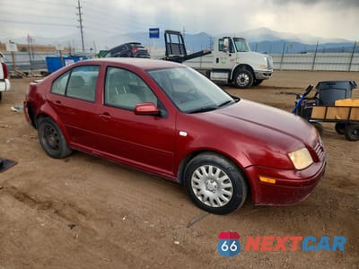 Czwarte zdjęcie samochodu z boku: 2000 VOLKSWAGEN JETTA GLS VIN:3VWSA29M5YM012707 - miniatura
