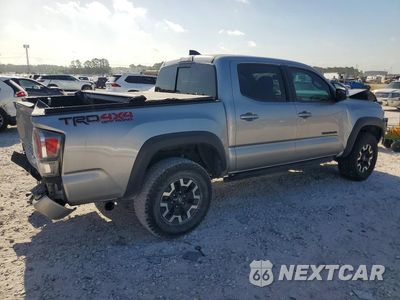 Trzecie zdjęcie samochodu z tyłu: 2021 TOYOTA TACOMA TRD OFF-ROAD VIN:5TFCZ5AN2MX266501 - miniatura