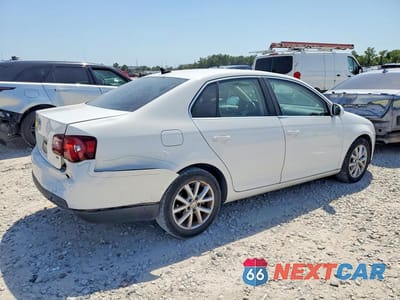Trzecie zdjęcie samochodu z tyłu: 2010 VOLKSWAGEN JETTA SE VIN:3VWRX7AJ0AM046040 - miniatura