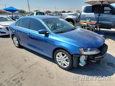 Czwarte zdjęcie samochodu z boku: 2017 VOLKSWAGEN JETTA S VIN:3VW2B7AJ2HM224296 - miniatura