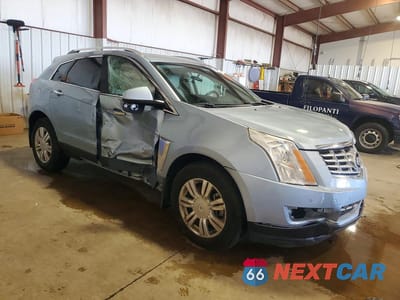 Czwarte zdjęcie samochodu z boku: 2014 CADILLAC SRX LUXURY COLLECTION VIN:3GYFNEE34ES592587 - miniatura