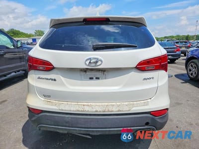 Zdjęcie 6 z 12 samochodu: 2013 HYUNDAI SANTA FE SPORT 2.4L VIN:5XYZT3LB4DG046881 - miniatura