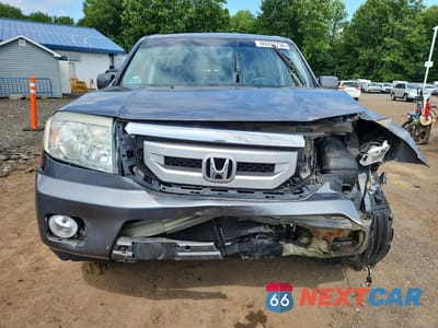 Piąte zdjęcie samochodu w środku: 2011 HONDA PILOT EXL VIN:5FNYF4H53BB104866 - miniatura