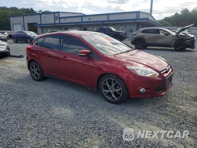 Czwarte zdjęcie samochodu z boku: 2014 FORD FOCUS SE VIN:1FADP3K26EL333604 - miniatura