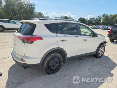 Trzecie zdjęcie samochodu z tyłu: 2018 TOYOTA RAV4 LE VIN:JTMZFREV0JJ200984 - miniatura