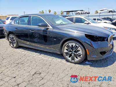 Czwarte zdjęcie samochodu z boku: 2024 BMW 530 I VIN:WBA43FJ03RCR22054 - miniatura