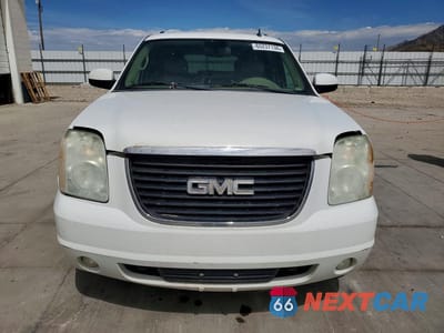 Piąte zdjęcie samochodu w środku: 2010 GMC YUKON XL K1500 SLT VIN:1GKUKKE3XAR257906 - miniatura