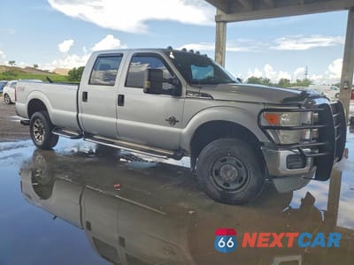 Czwarte zdjęcie samochodu z boku: 2014 FORD F350 SUPER DUTY VIN:1FT8W3BT8EEA37589 - miniatura