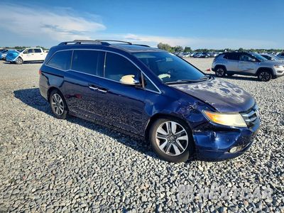 Czwarte zdjęcie samochodu z boku: 2014 HONDA ODYSSEY TOURING VIN:5FNRL5H96EB131196 - miniatura