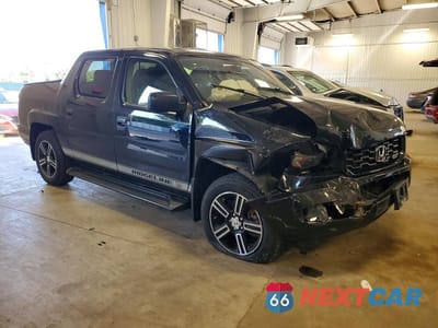 Czwarte zdjęcie samochodu z boku: 2014 HONDA RIDGELINE SPORT VIN:5FPYK1F71EB006803 - miniatura