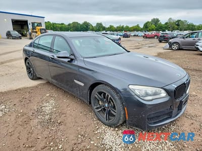 Czwarte zdjęcie samochodu z boku: 2015 BMW 750 LXI VIN:WBAYF8C5XFD654915 - miniatura