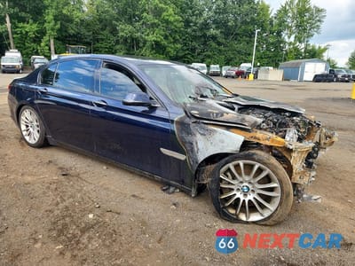 Czwarte zdjęcie samochodu z boku: 2014 BMW 750 LXI VIN:WBAYF8C58ED142505 - miniatura
