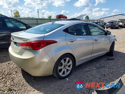 Trzecie zdjęcie samochodu z tyłu: 2013 HYUNDAI ELANTRA LIMITED VIN:5NPDH4AE3DH172088 - miniatura