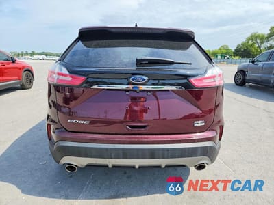 Zdjęcie 6 z 13 samochodu: 2019 FORD EDGE SEL VIN:2FMPK4J90KBB11531 - miniatura