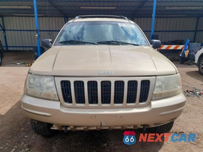 Piąte zdjęcie samochodu w środku: 1999 JEEP GRAND CHEROKEE LIMITED VIN:1J4GW68NXXC696921 - miniatura