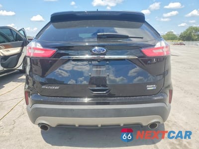 Zdjęcie 6 z 13 samochodu: 2019 FORD EDGE SEL VIN:2FMPK4J98KBC45364 - miniatura