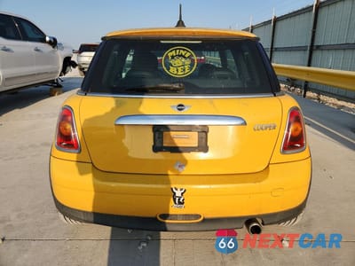 Zdjęcie 7 z 14 samochodu: 2009 MINI COOPER VIN:WMWMF33509TU70997 - miniatura