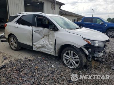Czwarte zdjęcie samochodu z boku: 2019 CHEVROLET EQUINOX PREMIER VIN:2GNAXPEX7K6216623 - miniatura