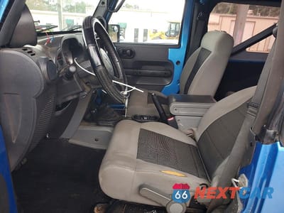 Zdjęcie 7 z 12 samochodu: 2010 JEEP WRANGLER SPORT VIN:1J4AA2D18AL136998 - miniatura