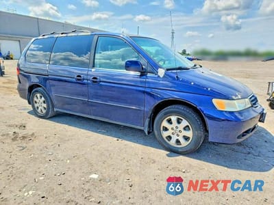 Czwarte zdjęcie samochodu z boku: 2004 HONDA ODYSSEY EXL VIN:5FNRL18064B037635 - miniatura