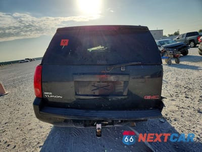 Zdjęcie 6 z 13 samochodu: 2011 GMC YUKON SLE VIN:1GKS1AE09BR214329 - miniatura