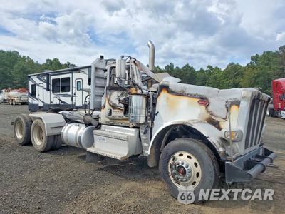 Czwarte zdjęcie samochodu z boku: 2021 PETERBILT 389 SEMI TRUCK VIN:1XPXD40X1MD732190 - miniatura