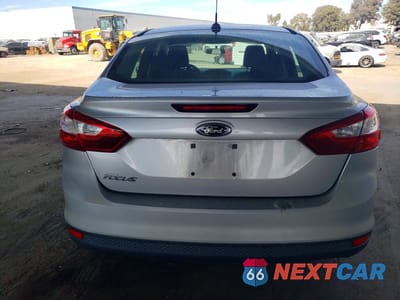 Zdjęcie 6 z 12 samochodu: 2014 FORD FOCUS S VIN:1FADP3E28EL150779 - miniatura