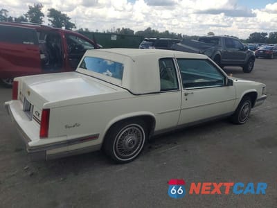 Trzecie zdjęcie samochodu z tyłu: 1988 CADILLAC DEVILLE VIN:1G6CD1150J4301933 - miniatura
