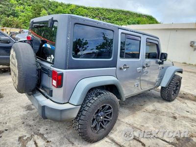Trzecie zdjęcie samochodu z tyłu: 2017 JEEP WRANGLER UNLIMITED SPORT VIN:1C4BJWDG2HL556255 - miniatura