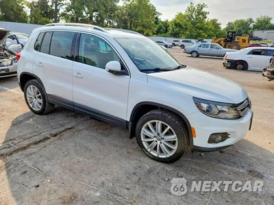 Czwarte zdjęcie samochodu z boku: 2016 VOLKSWAGEN TIGUAN S VIN:WVGBV7AX5GW541210 - miniatura
