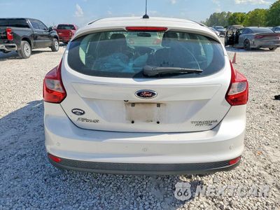 Zdjęcie 6 z 12 samochodu: 2014 FORD FOCUS TITANIUM VIN:1FADP3N22EL195927 - miniatura
