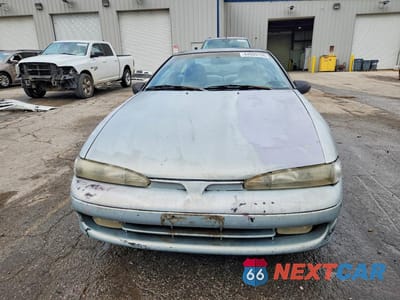 Piąte zdjęcie samochodu w środku: 1994 MITSUBISHI ECLIPSE VIN:4A3CF34B2RE095909 - miniatura