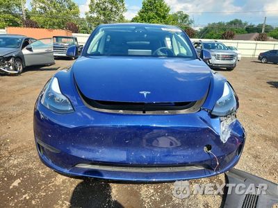 Piąte zdjęcie samochodu w środku: 2025 TESLA MODEL Y VIN:7SAYGAEE0SF260642 - miniatura