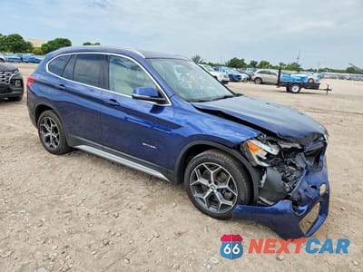 Czwarte zdjęcie samochodu z boku: 2018 BMW X1 SDRIVE28I VIN:WBXHU7C36J5H45075 - miniatura