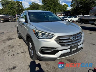 Czwarte zdjęcie samochodu z boku: 2017 HYUNDAI SANTA FE SPORT 2.4L VIN:5XYZTDLB0HG463409 - miniatura