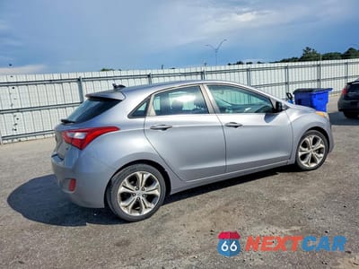Trzecie zdjęcie samochodu z tyłu: 2013 HYUNDAI ELANTRA GT BASE VIN:KMHD35LE2DU048297 - miniatura