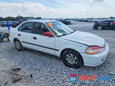 Czwarte zdjęcie samochodu z boku: 1997 HONDA CIVIC LX VIN:2HGEJ6678VH529341 - miniatura