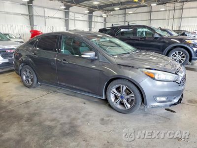 Czwarte zdjęcie samochodu z boku: 2017 FORD FOCUS SE VIN:1FADP3FE7HL303603 - miniatura