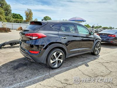 Trzecie zdjęcie samochodu z tyłu: 2016 HYUNDAI TUCSON LIMITED VIN:KM8J33A23GU165066 - miniatura